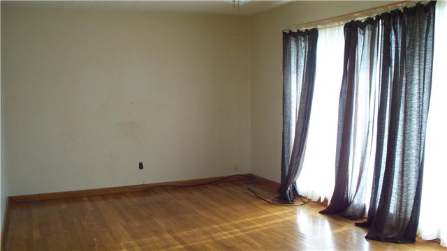 519 West Point Road Lawrenceburg, TN 38464 - Photo 2 of 4 a view of a room with large windows