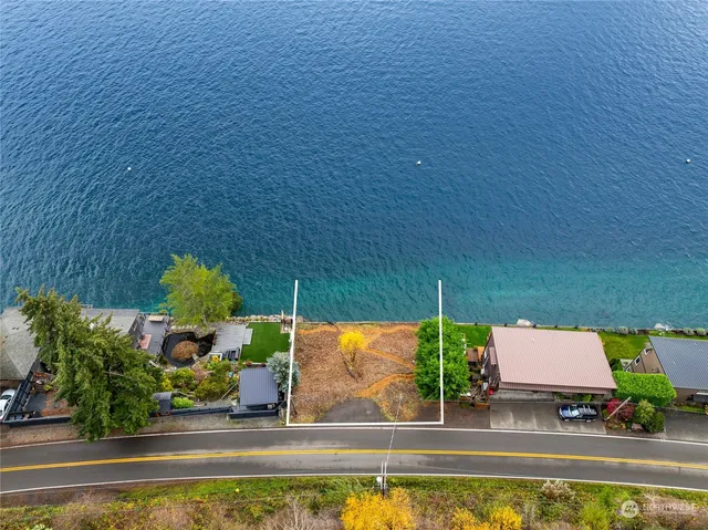 a view of swimming pool with outdoor seating