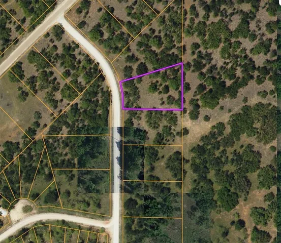 a sign board on the side of a road