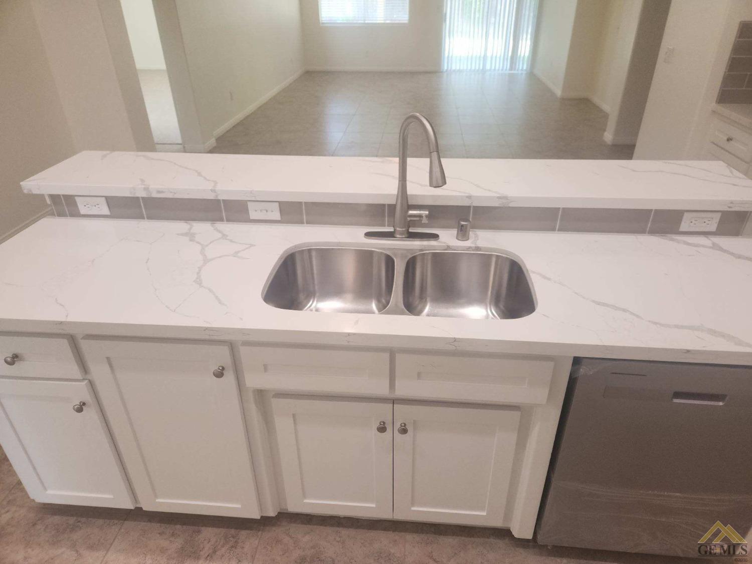 Undisclosed Address Bakersfield, CA 93311 - Photo 6 of 9 a close view of sink and tap