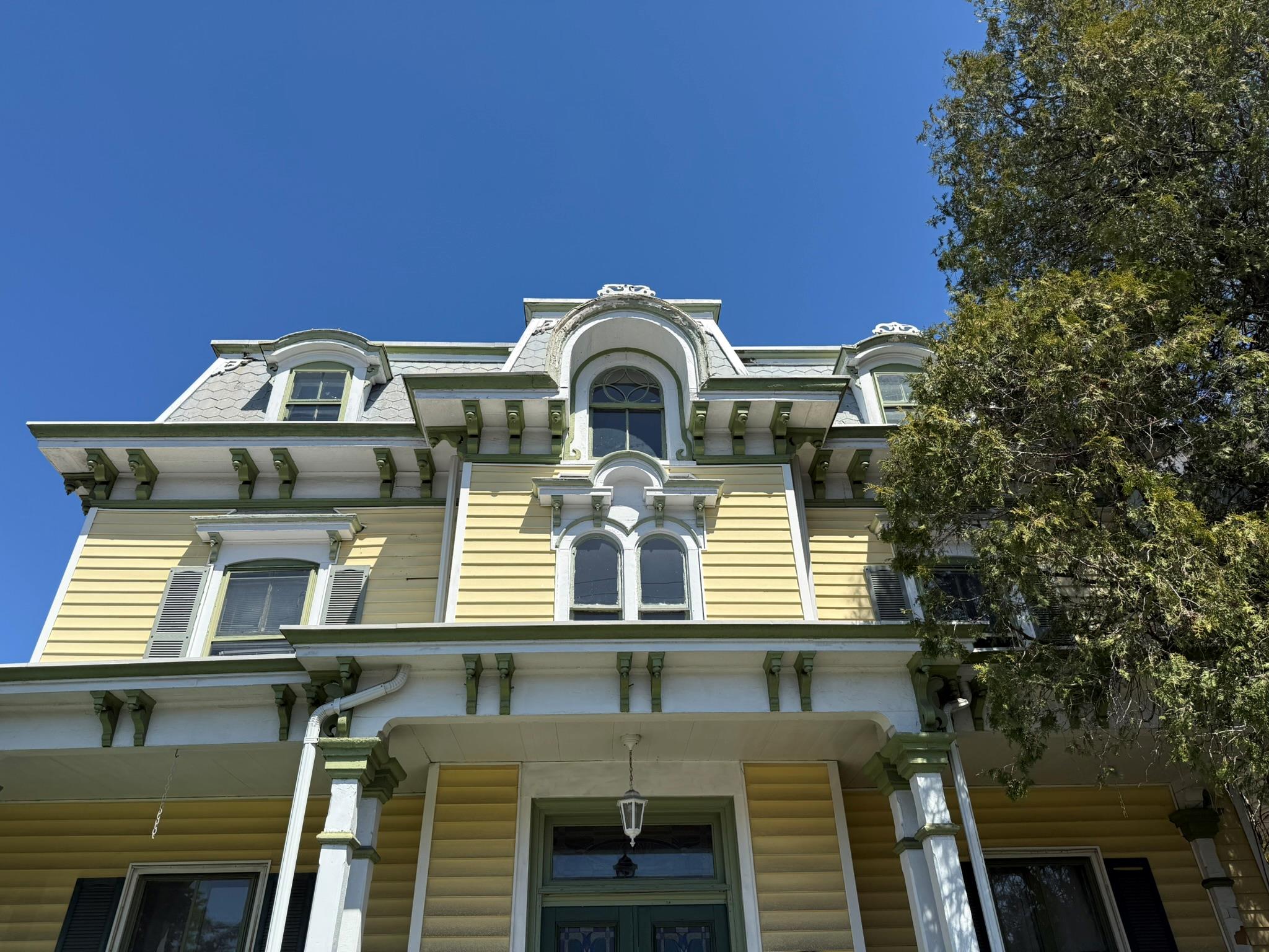 1204 Main Street Peekskill, NY 10566 - Photo 11 of 21 a front view of a house with a yard