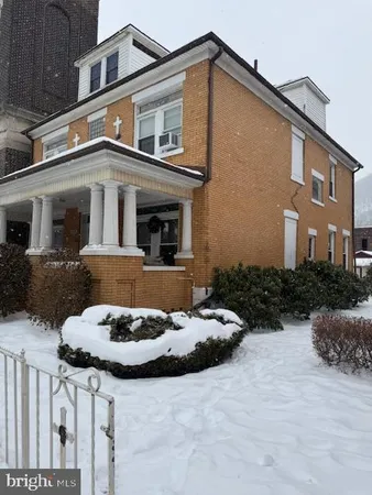 a front view of a house with entertaining space