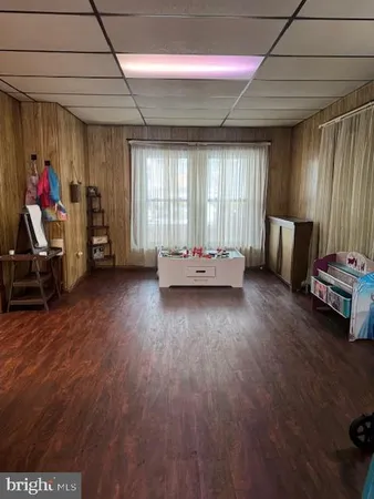 a view of a door and a window