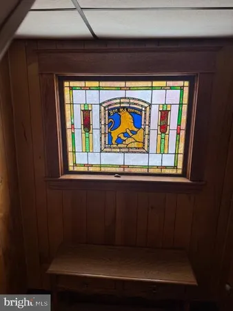 a kitchen with a refrigerator and a stove