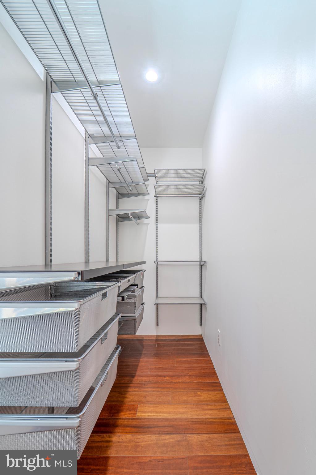 225 South 49th Street, Unit 2 Philadelphia, PA 19139 - Photo 13 of 26 a view of a hallway with wooden floor and staircase