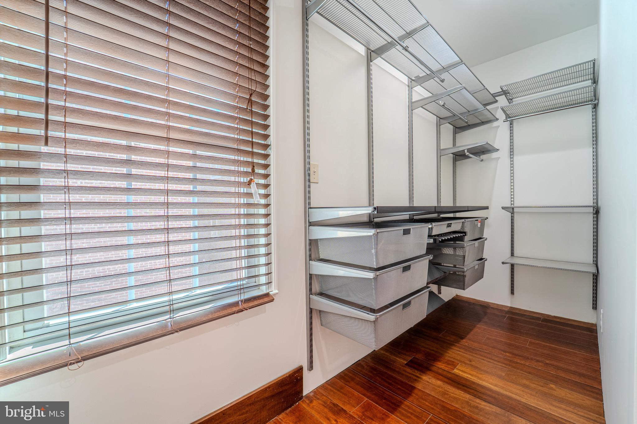 225 South 49th Street, Unit 2 Philadelphia, PA 19139 - Photo 14 of 26 a view of walk in closet with empty racks