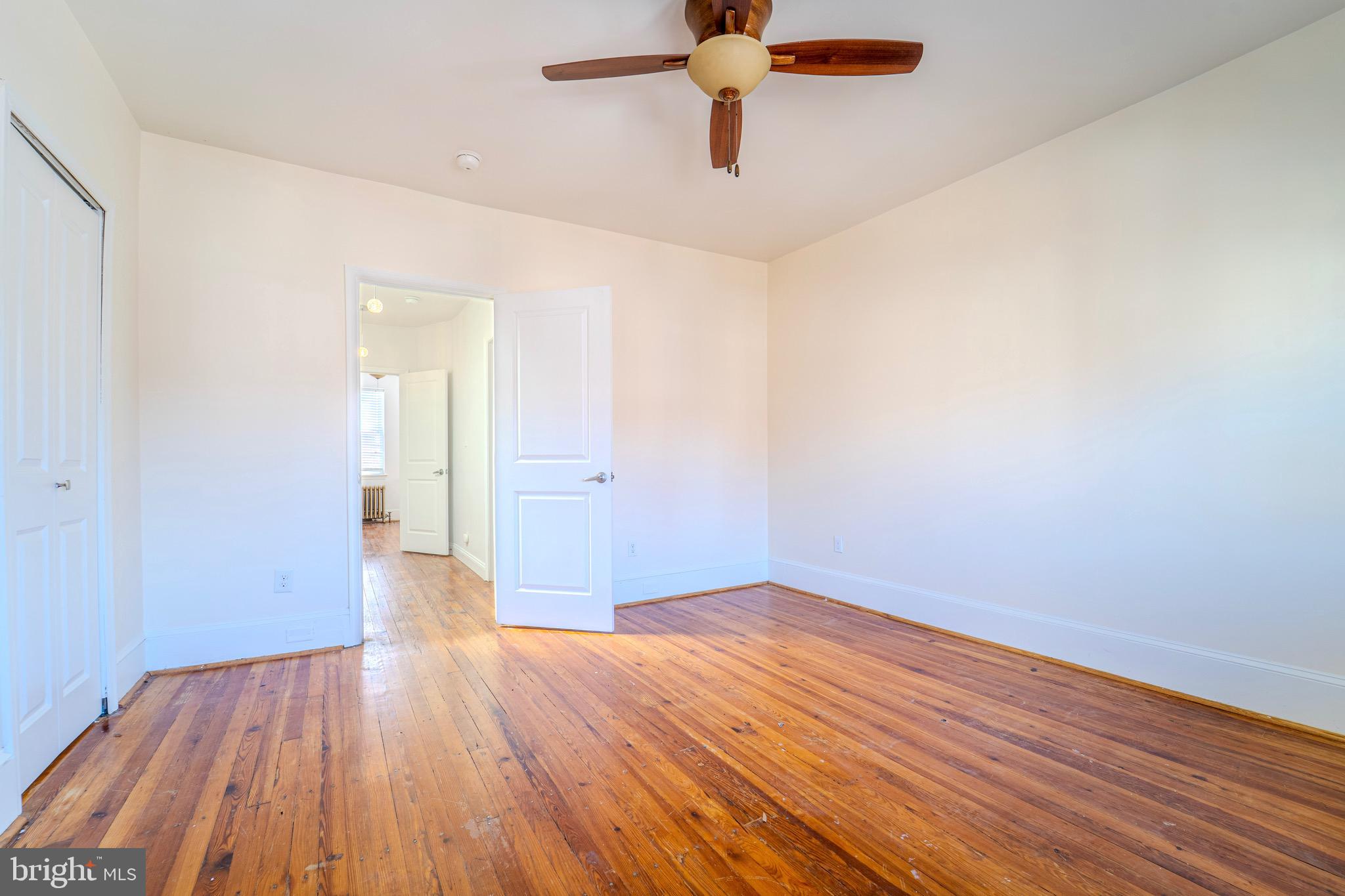 225 South 49th Street, Unit 2 Philadelphia, PA 19139 - Photo 21 of 26 a view of empty room with wooden floor