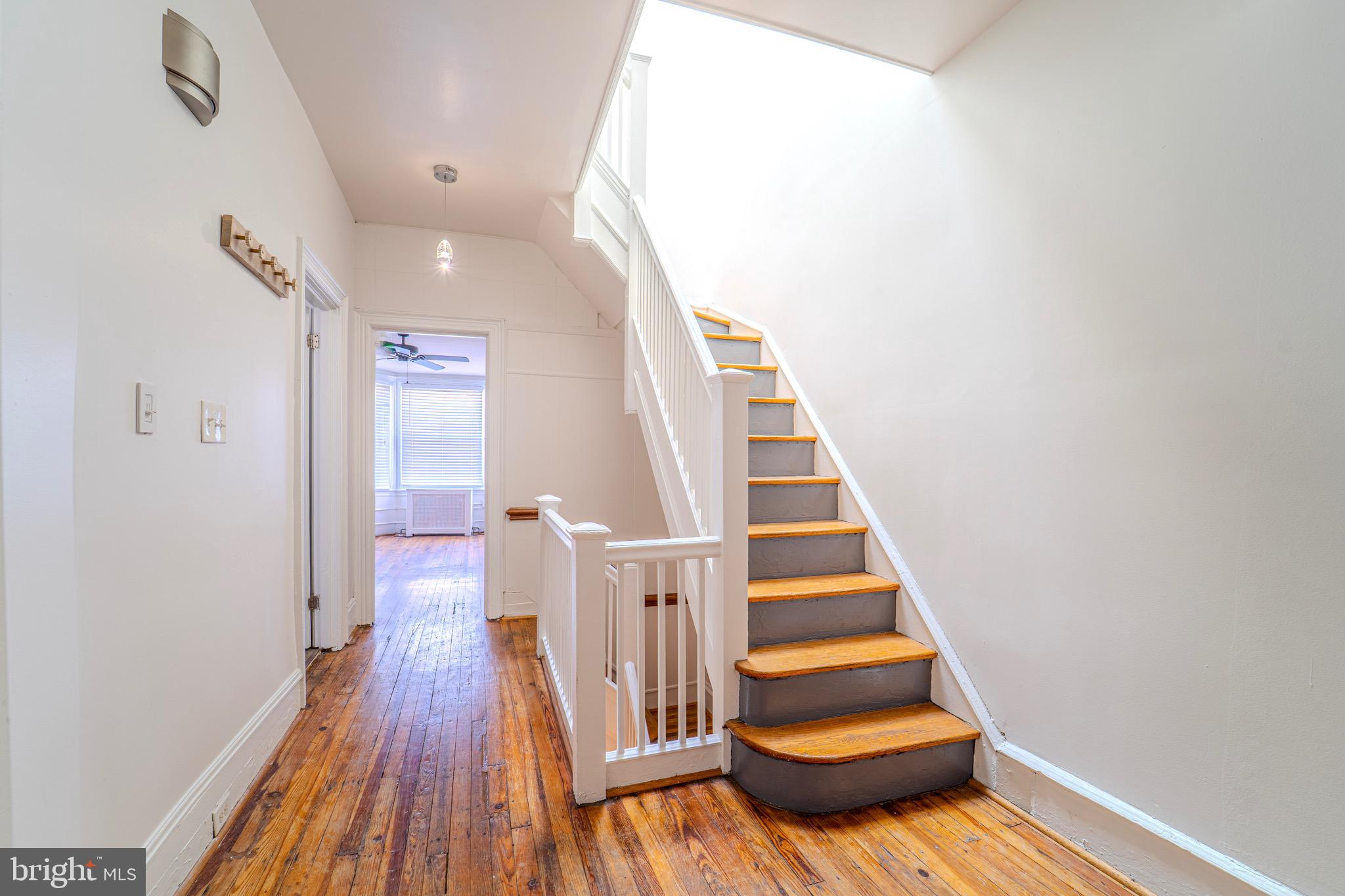225 South 49th Street, Unit 2 Philadelphia, PA 19139 - Photo 3 of 26 a view of entryway with wooden floor
