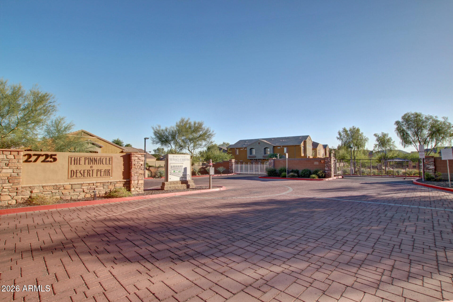 2725 East Mine Creek Road, Unit 1101 Phoenix, AZ 85024 - Photo 42 of 43 a view of a house with a yard