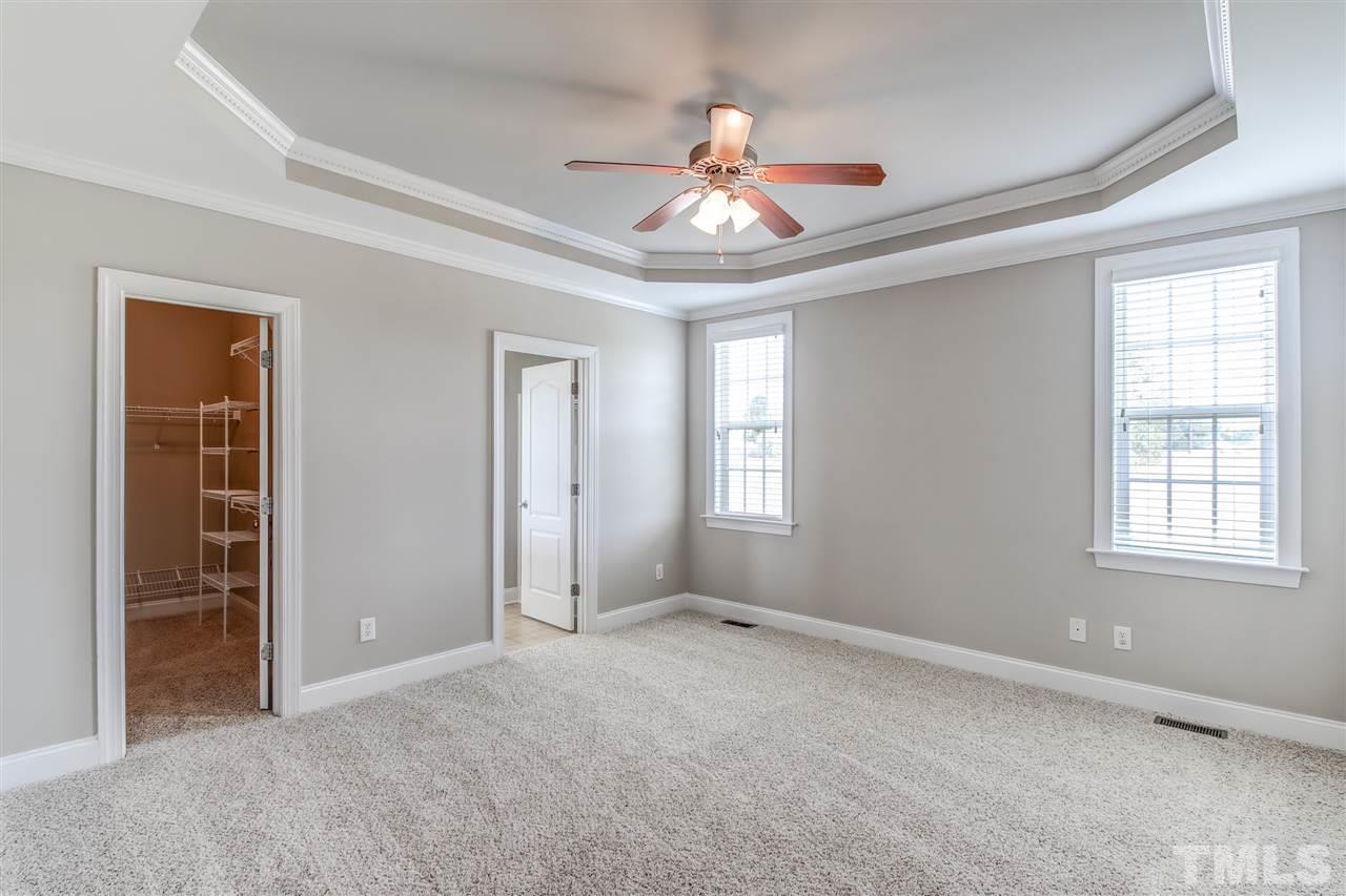 8905 Oregon Inlet Court Raleigh, NC 27603 - Photo 18 of 30 a view of an empty room with a window