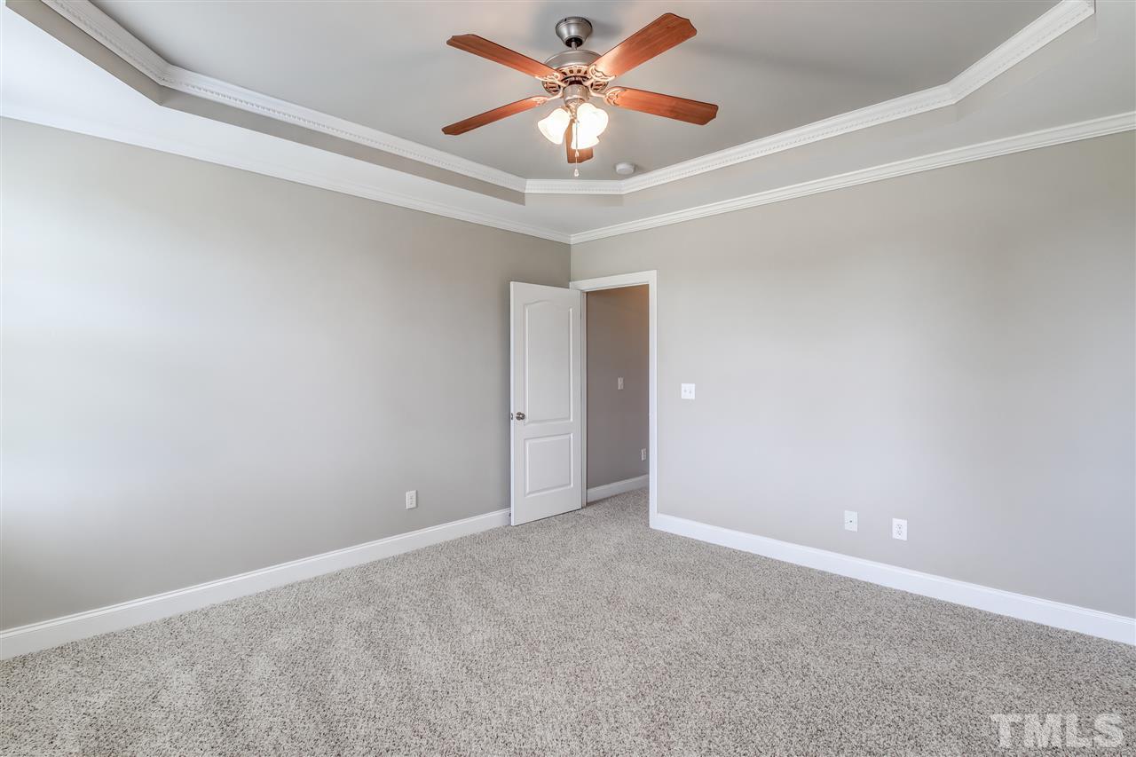 8905 Oregon Inlet Court Raleigh, NC 27603 - Photo 19 of 30 a view of an empty room