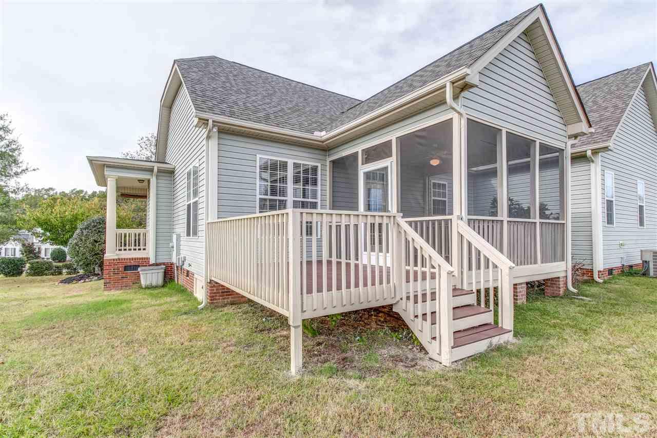 8905 Oregon Inlet Court Raleigh, NC 27603 - Photo 27 of 30 front view of a house with a yard