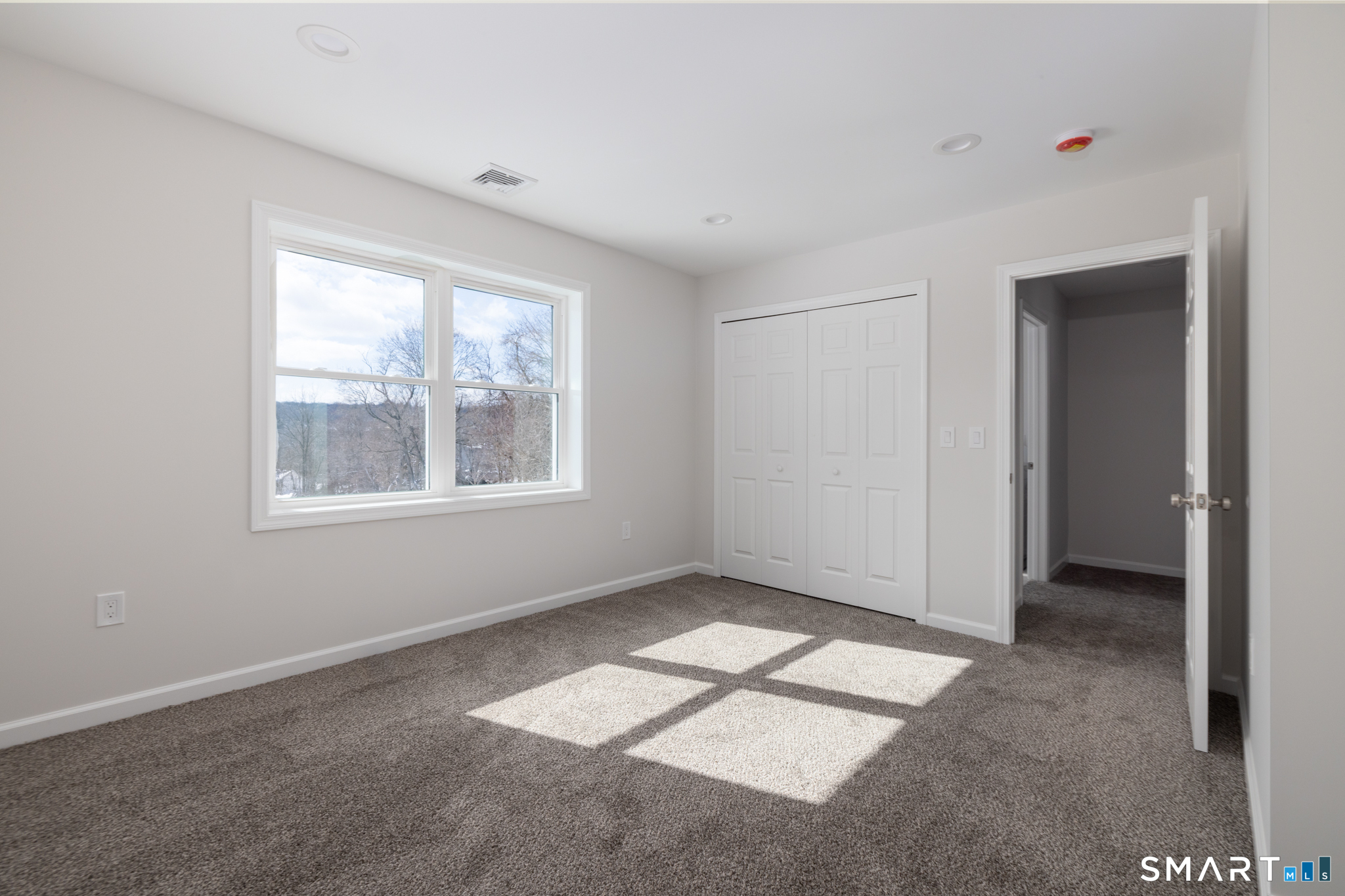 75 High Street Plymouth, CT 06786 - Photo 11 of 17 a view of an empty room with a window