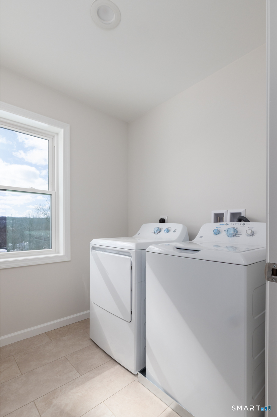 75 High Street Plymouth, CT 06786 - Photo 12 of 17 a utility room with dryer and washer
