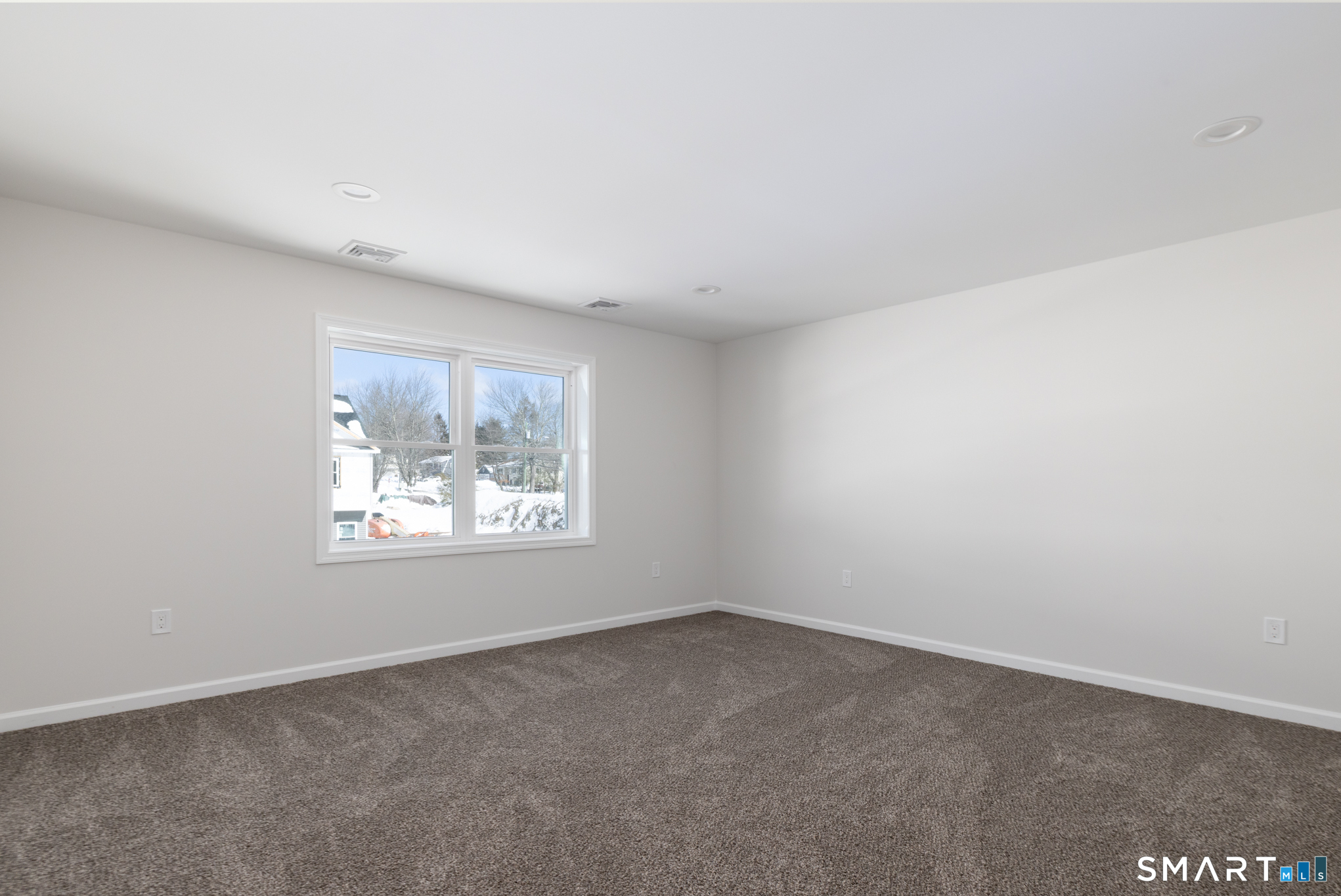 75 High Street Plymouth, CT 06786 - Photo 10 of 17 an empty room with windows