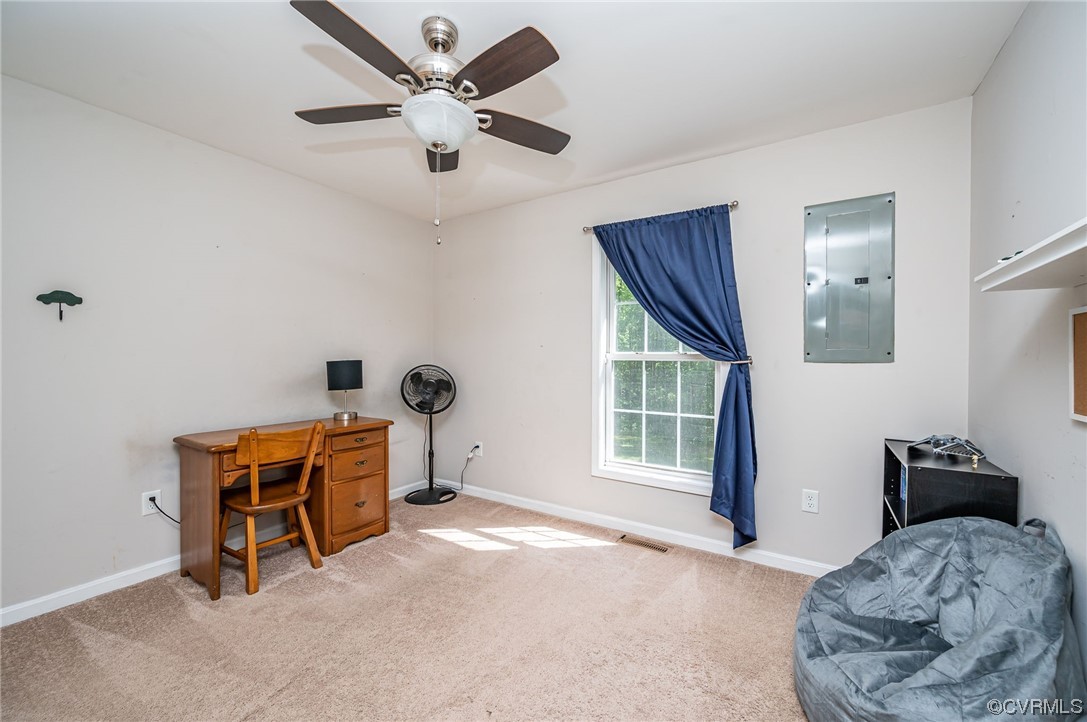 4640 Three Chopt Road Gum Spring, VA 23065 - Photo 16 of 27 a bedroom with furniture and a window