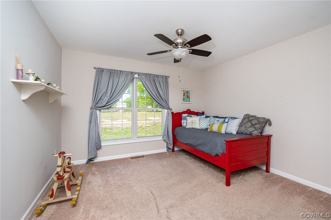 4640 Three Chopt Road Gum Spring, VA 23065 - Photo 18 of 27 a living room with furniture and a window