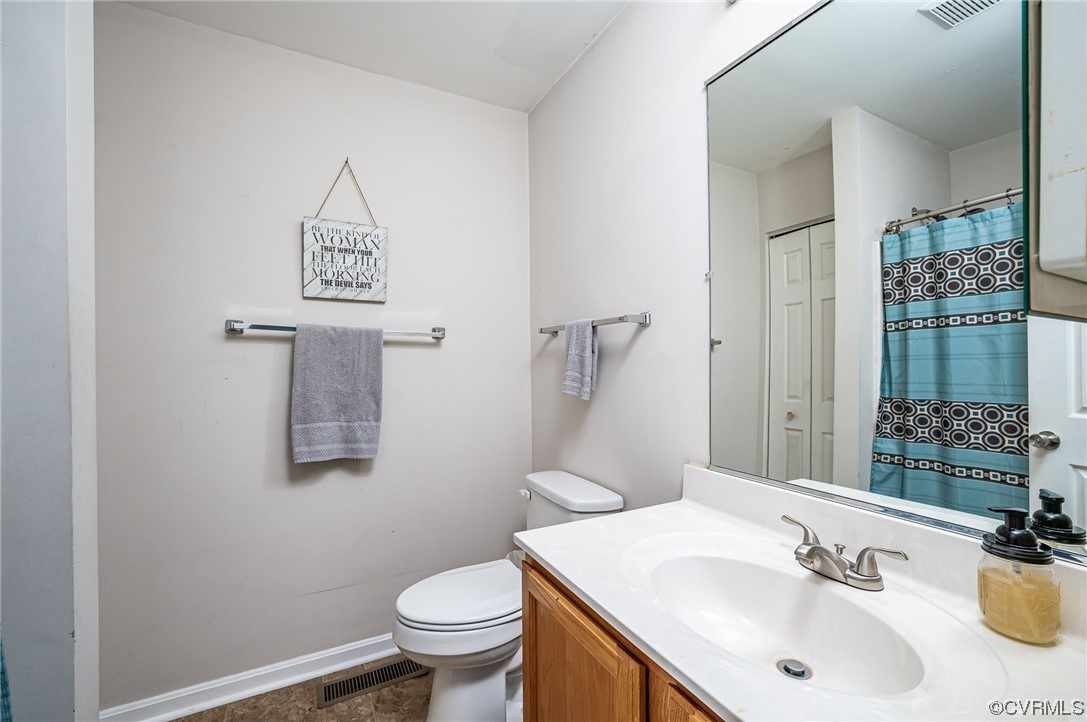 4640 Three Chopt Road Gum Spring, VA 23065 - Photo 22 of 27 a bathroom with a sink toilet and shower