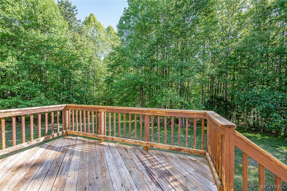 4640 Three Chopt Road Gum Spring, VA 23065 - Photo 23 of 27 a view of wooden deck and a yard with wooden fence