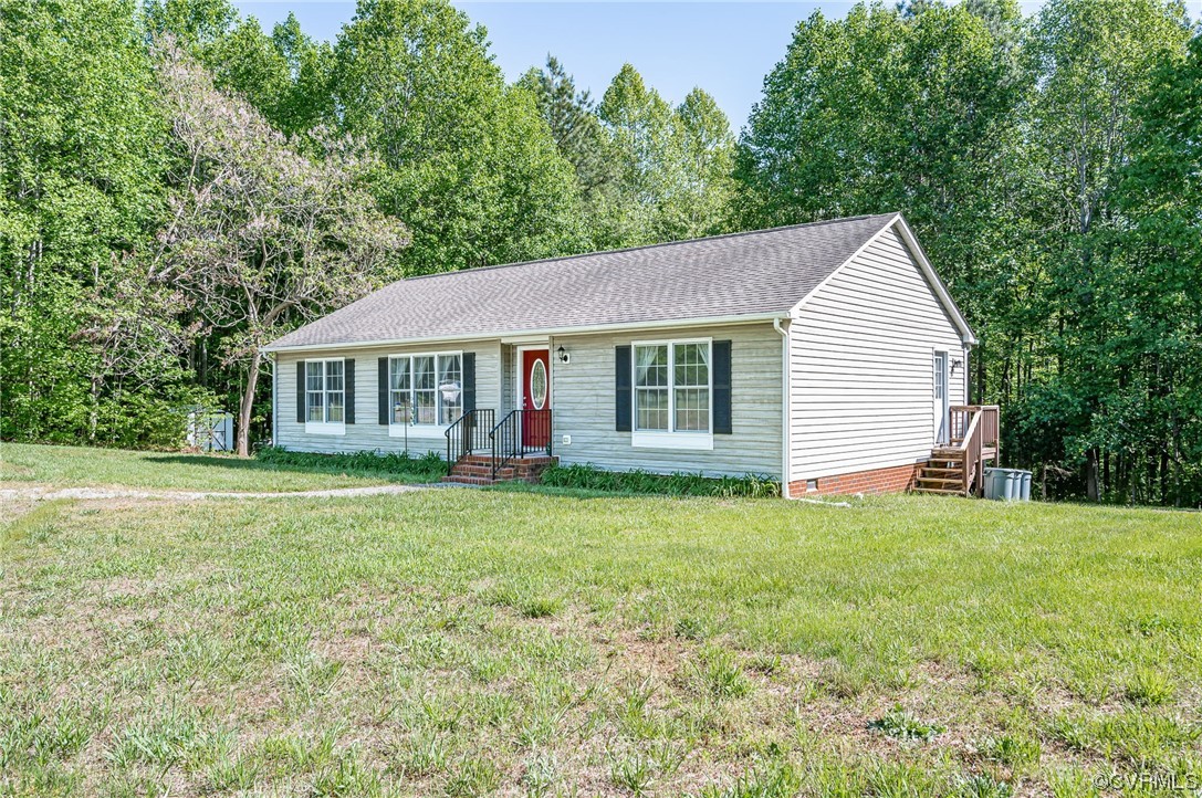 4640 Three Chopt Road Gum Spring, VA 23065 - Photo 3 of 27 a view of a house with a backyard