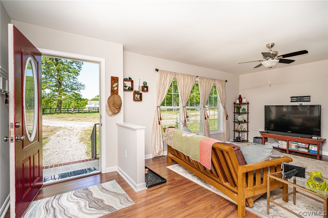 4640 Three Chopt Road Gum Spring, VA 23065 - Photo 5 of 27 a living room with furniture tv and a large window