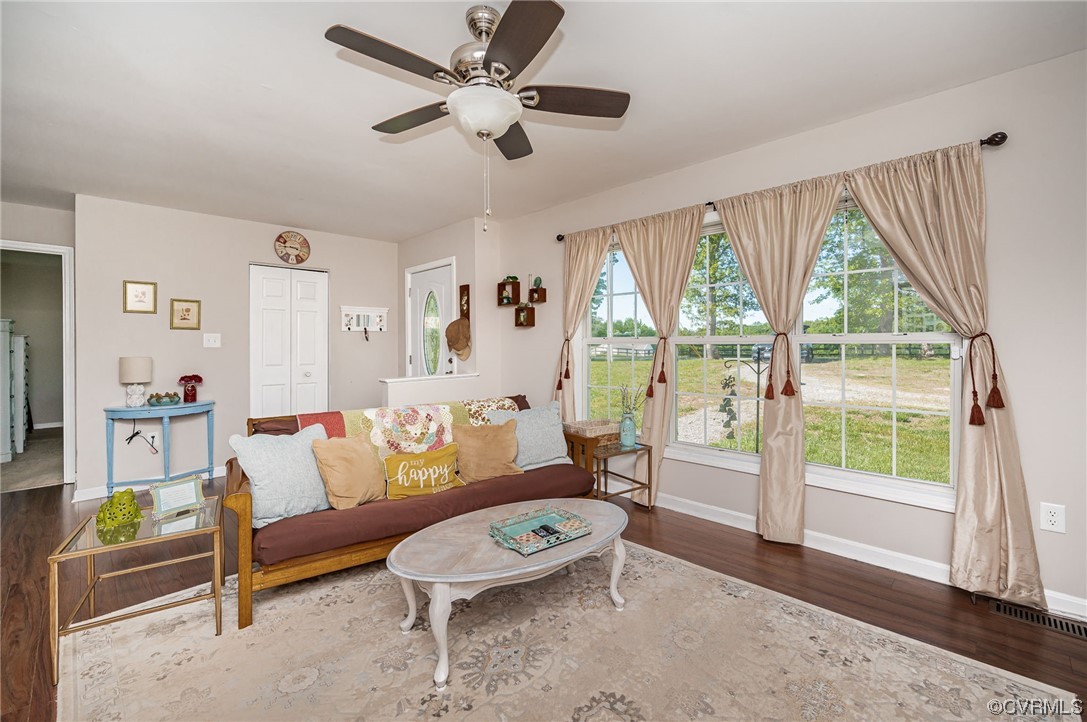 4640 Three Chopt Road Gum Spring, VA 23065 - Photo 8 of 27 a living room with furniture and a large window