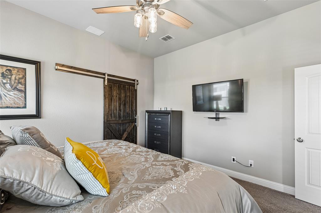108 Maverick Lane Pilot Point, TX 76258 - Photo 18 of 27 Vaulted ceiling featuring a ceiling fan with integrated lighting