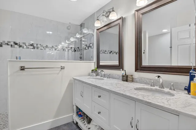 a living room with furniture and flat screen tv