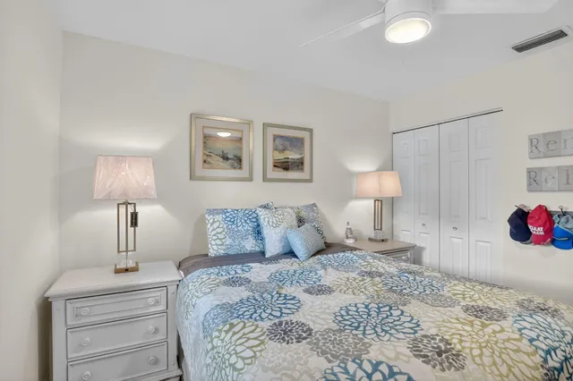 a bathroom with a double vanity sink mirror and
