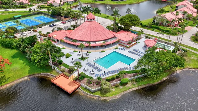 a outdoor space with lots of tables and chairs