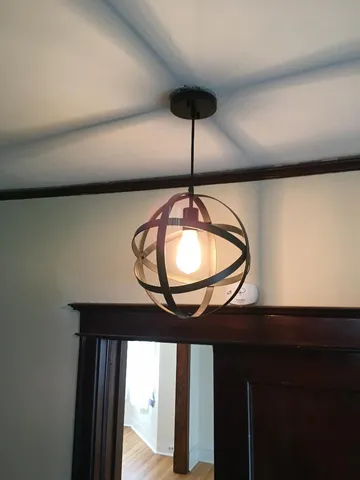 a table room with a dining table and chairs