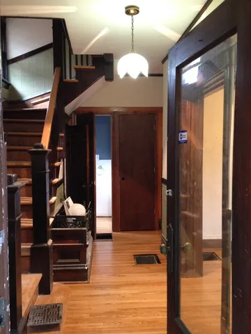 a room with closet and a chandelier