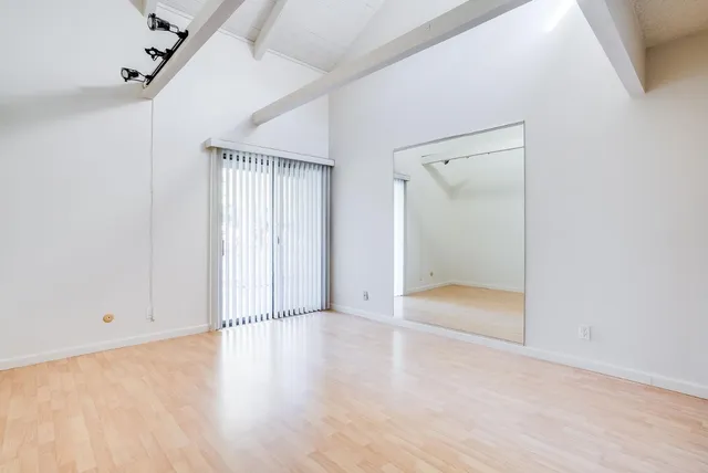 a bathroom with a double vanity sink and mirror