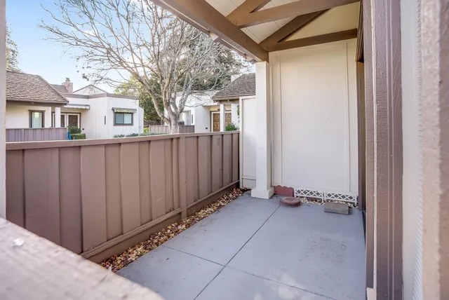 a bathroom with a granite countertop sink mirror and a