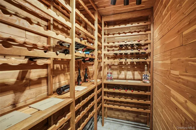 a view of a balcony with stairs and wooden floor