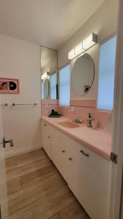 a bathroom with a shower and a toilet