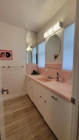 a bathroom with a shower and a toilet