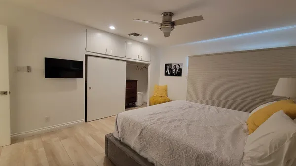 a bathroom with a double vanity sink and mirror