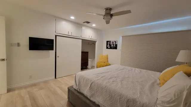 a bathroom with a double vanity sink and mirror