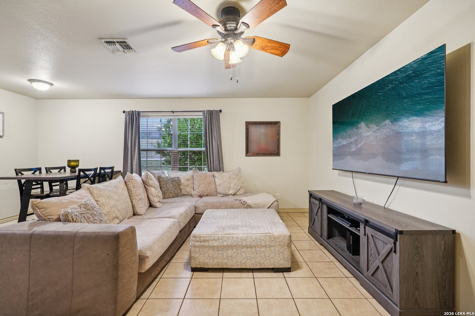 2312 Sailing Way, Unit D Kerrville, TX 78028 - Photo 5 of 25 a living room with furniture and a flat screen tv