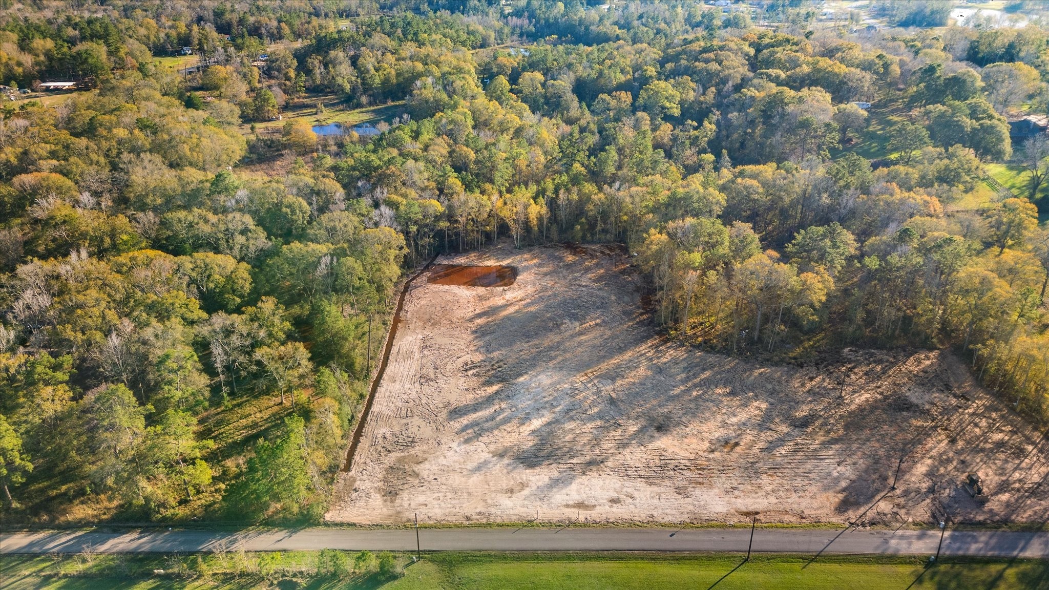 628 County Road 377 Cleveland, TX 77327 - Photo 4 of 10 a view of a yard