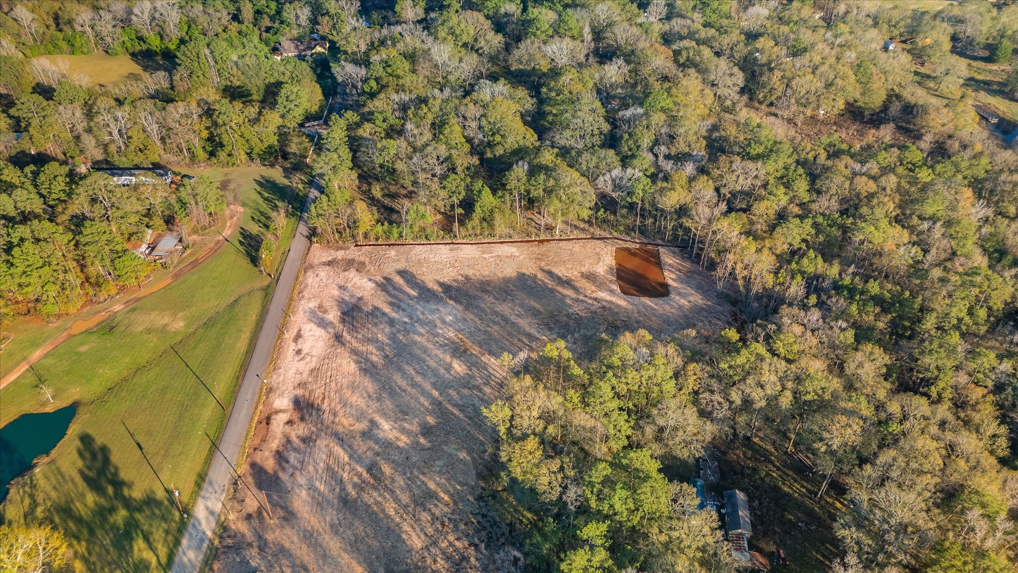 628 County Road 377 Cleveland, TX 77327 - Photo 5 of 10 a view of a yard