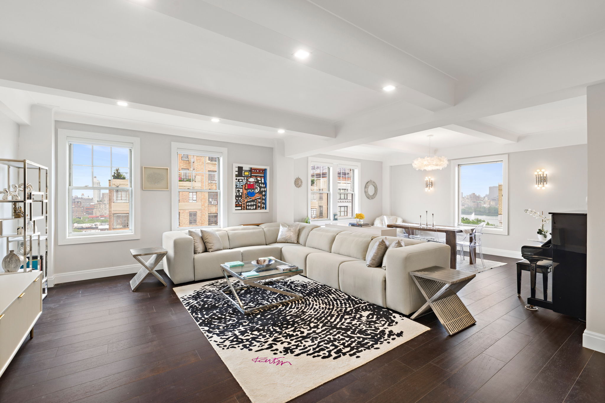 10 West 86th Street, Unit PH15A Manhattan, NY 10024 - Photo 1 of 34 a living room with furniture rug and window