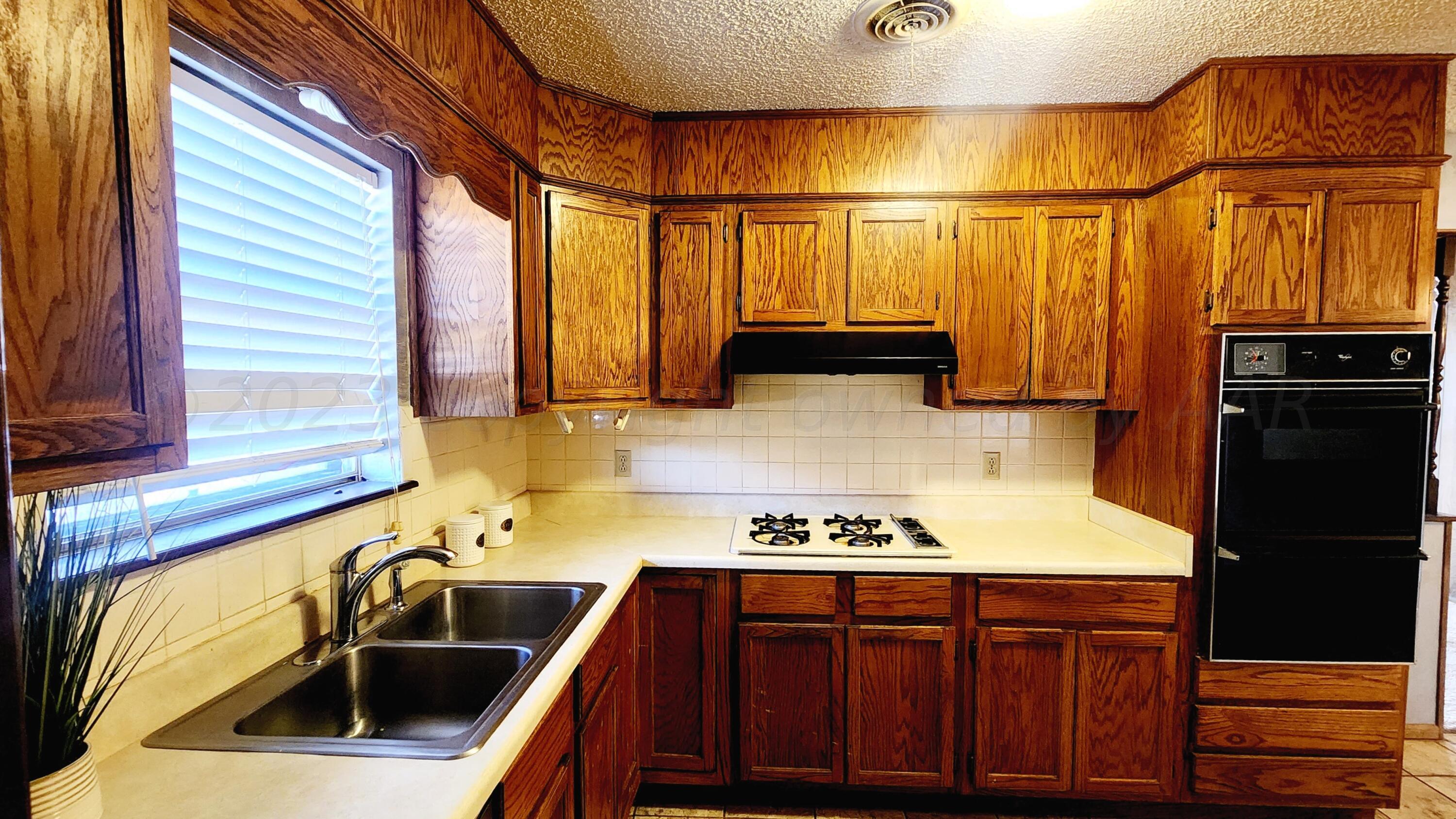 5135 McCarty Boulevard Amarillo, TX 79110 - Photo 8 of 21 KITCHEN 3