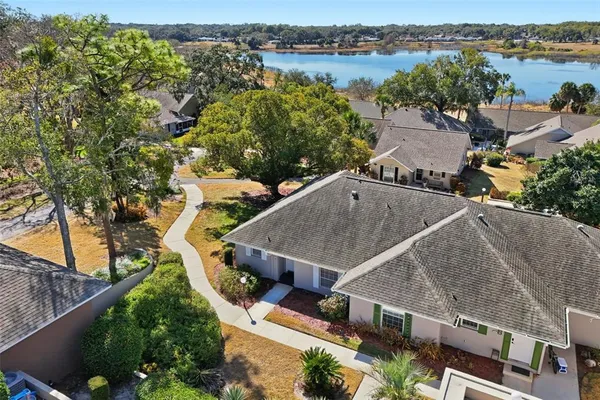 an aerial view of a house with a outdoor space