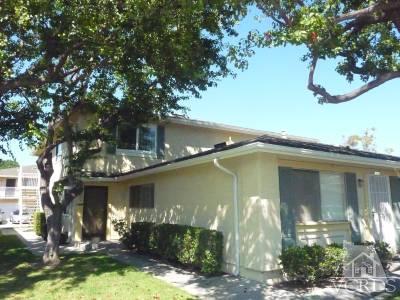 2603 Rudder Avenue Port Hueneme, CA 93041 - Photo 1 of 6 a front view of a house with a yard garage and outdoor seating