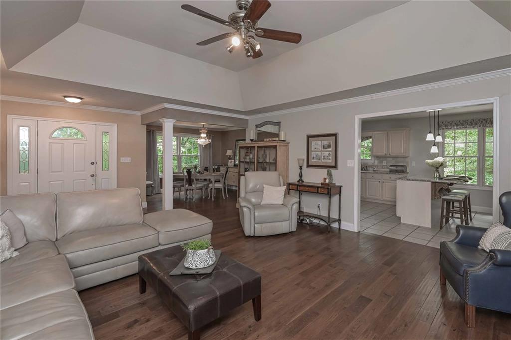 5885 West Chapel Hill Road Douglasville, GA 30135 - Photo 14 of 42 a living room with furniture and a wooden floor