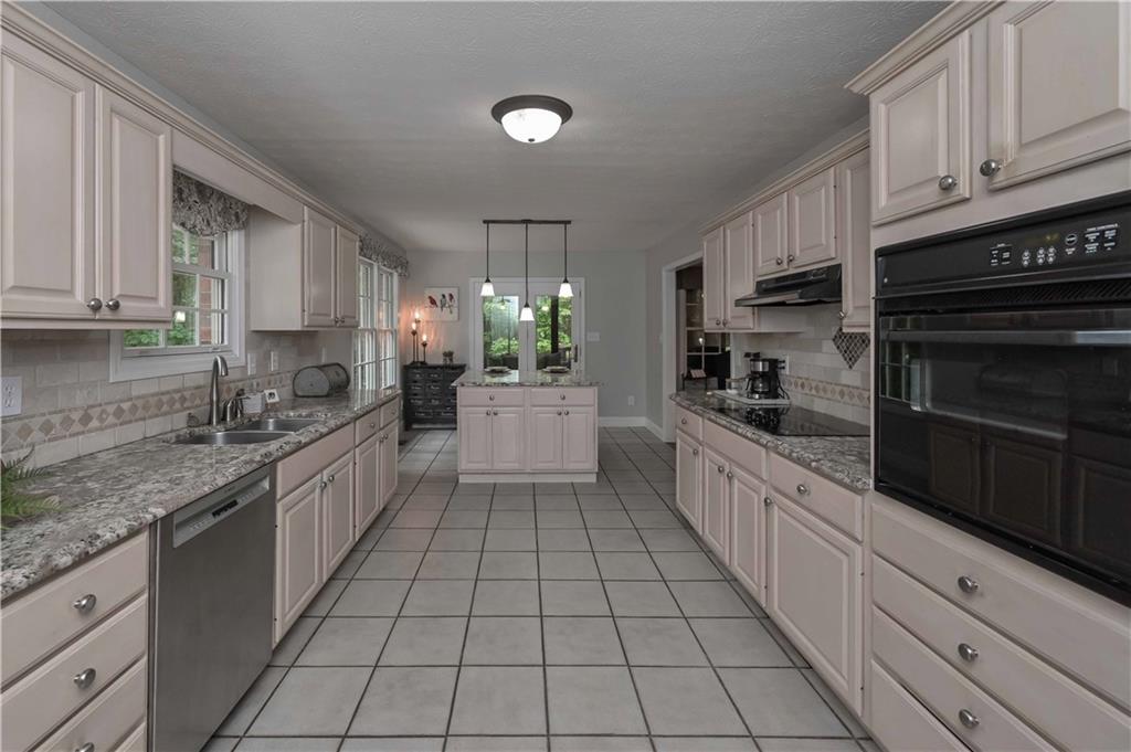 5885 West Chapel Hill Road Douglasville, GA 30135 - Photo 20 of 42 a large kitchen with cabinets