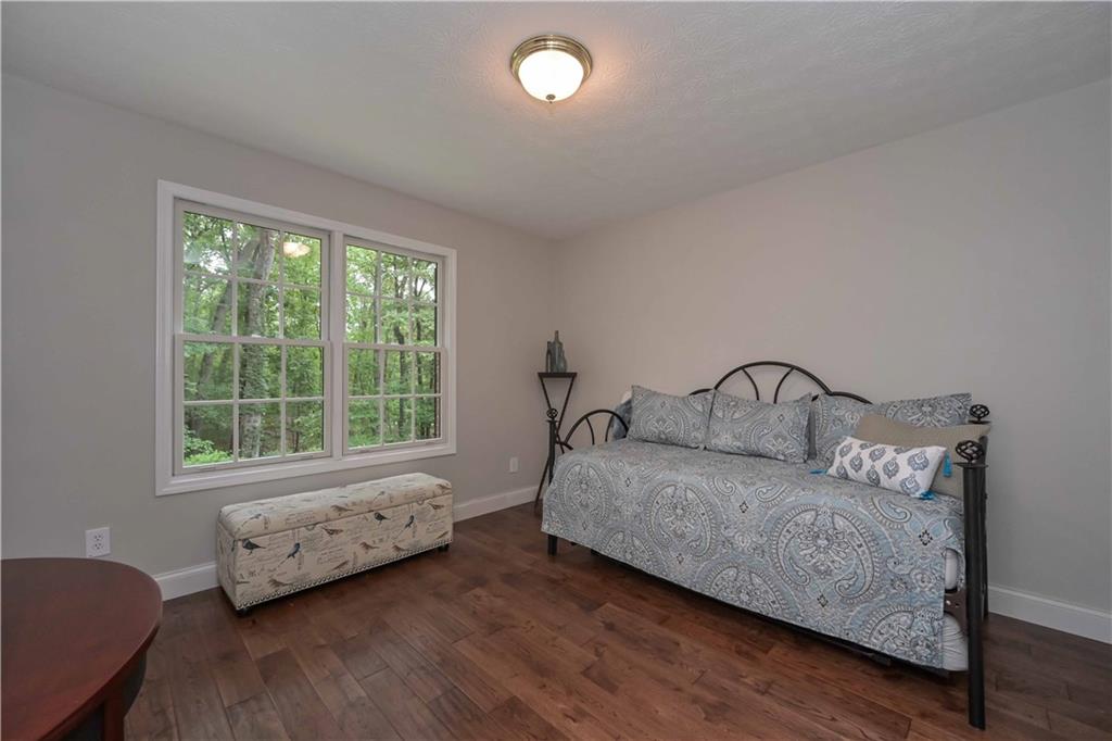 5885 West Chapel Hill Road Douglasville, GA 30135 - Photo 22 of 42 a bedroom with a bed and a window