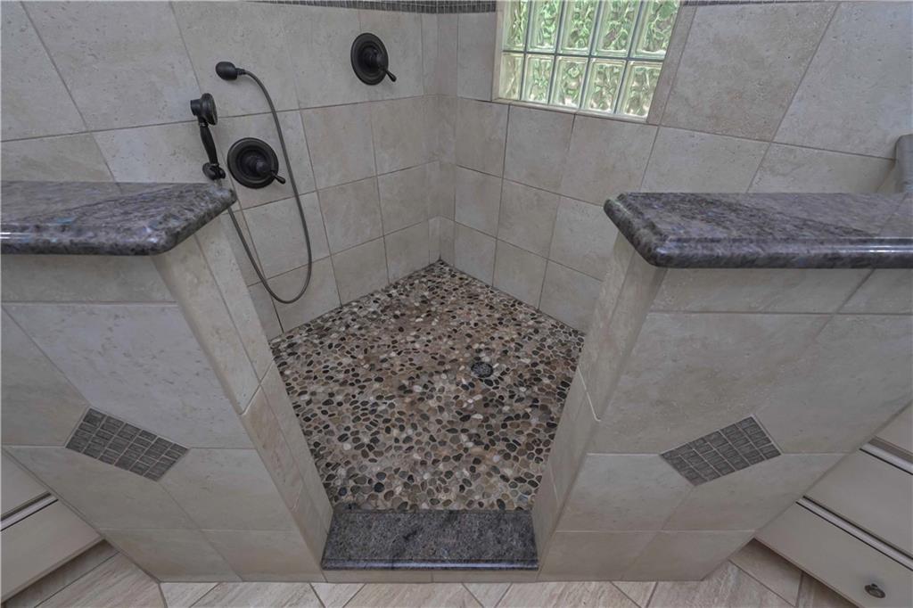 5885 West Chapel Hill Road Douglasville, GA 30135 - Photo 27 of 42 a bathroom with a shower